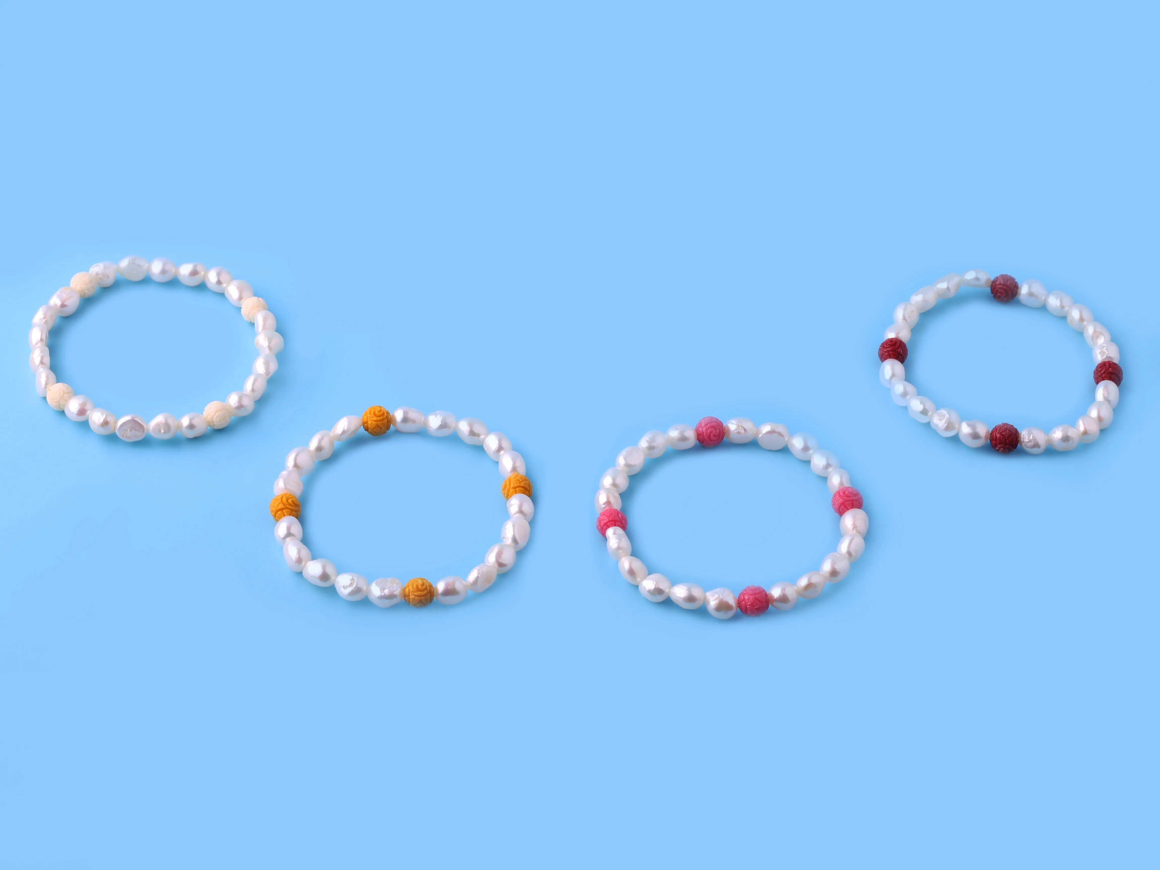 6.5-7mm Oval Shape Freshwater Pearl Bracelet and Coral Ball