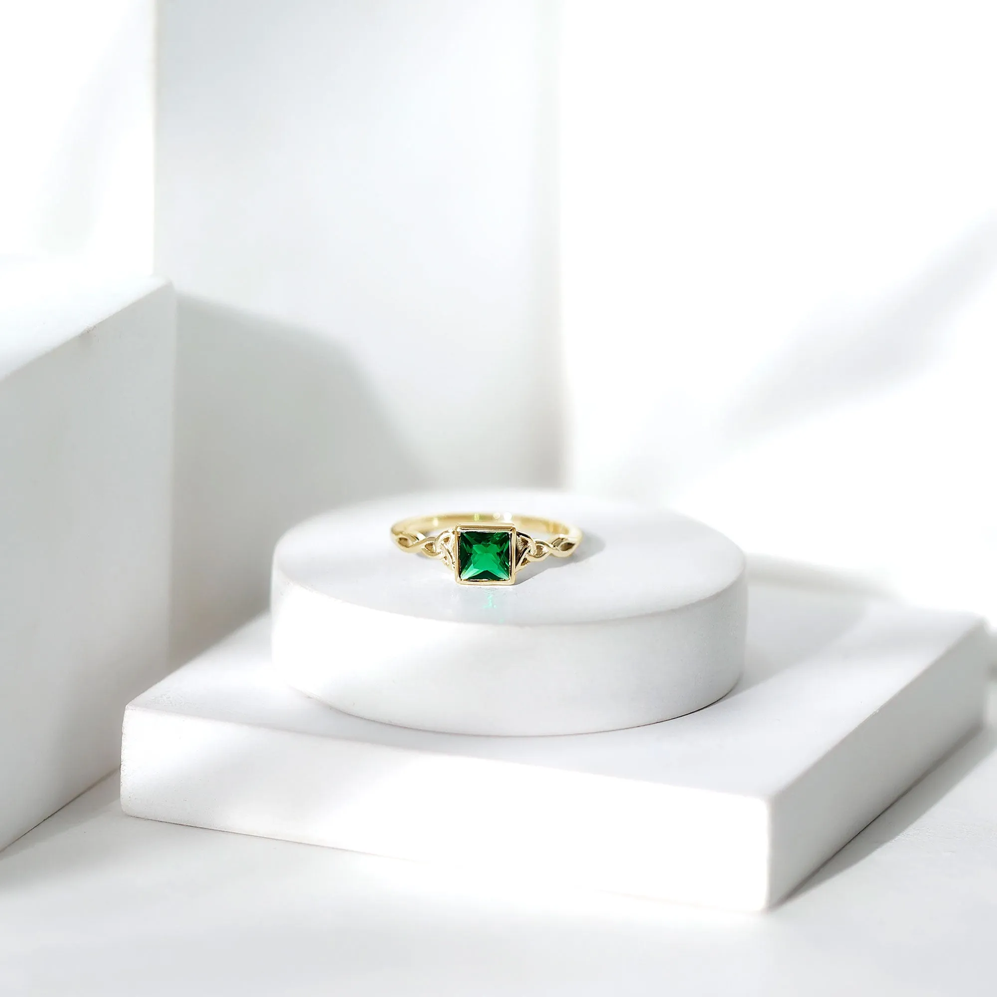 Princess Cut Lab Grown Emerald Solitaire Celtic Ring in Bezel Setting
